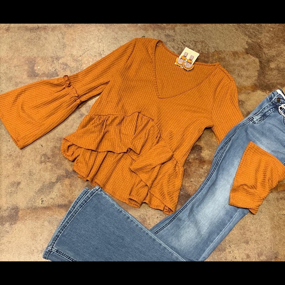 Burnt orange top, bell sleeves